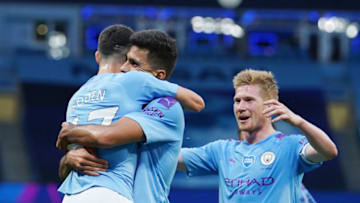 Phil Foden of Manchester City celebrates with Rodrigo (Photo by Dave Thompson/Pool via Getty Images)