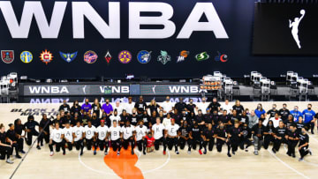PALMETTO, FLORIDA - AUGUST 26: The Atlanta Dream, Washington Mystics, Minnesota Lynx, and the Los Angeles Sparks kneel on the court after the teams collectively decided to postpone games in protest of the shooting of Jacob Blake at Feld Entertainment Center on August 26, 2020 in Palmetto, Florida. Several sporting leagues across the nation today are postponing their schedules as players protest the shooting of Jacob Blake by Kenosha, Wisconsin police. NOTE TO USER: User expressly acknowledges and agrees that, by downloading and or using this photograph, User is consenting to the terms and conditions of the Getty Images License Agreement. (Photo by Julio Aguilar/Getty Images)