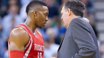 Oct 29, 2014; Salt Lake City, UT, USA; Houston Rockets head coach Kevin McHale talks with center Dwight Howard (12) during the second half against the Utah Jazz at EnergySolutions Arena. The Rockets won 104-93. Mandatory Credit: Russ Isabella-USA TODAY Sports