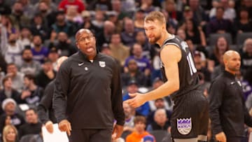 Sacramento Kings head coach Mike Brown and forward Domantas Sabonis. Mandatory Credit: Ed Szczepanski-USA TODAY Sports
