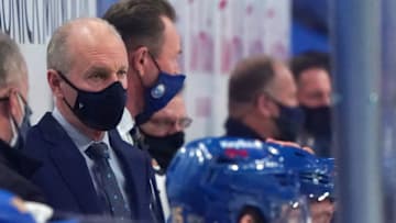 BUFFALO, NY - JANUARY 26: Head coach Ralph Krueger of the Buffalo Sabres watches play from the bench during the second period against the New York Rangers at KeyBank Center on January 26 , 2021 in Buffalo, New York. (Photo by Kevin Hoffman/Getty Images)
