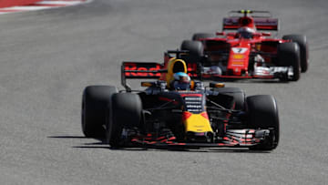 AUSTIN, TX - OCTOBER 22: Daniel Ricciardo of Australia driving the (3) Red Bull Racing Red Bull-TAG Heuer RB13 TAG Heuer leads Kimi Raikkonen of Finland driving the (7) Scuderia Ferrari SF70H on track during the United States Formula One Grand Prix at Circuit of The Americas on October 22, 2017 in Austin, Texas. (Photo by Clive Mason/Getty Images)