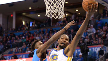Kevin Durant (35) drives to the basket in front of Oklahoma City Thunder forward Jerami Grant (9) . Mandatory Credit: Mark D. Smith-USA TODAY Sports