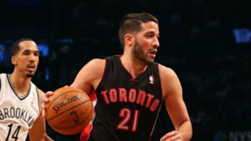 Apr 25, 2014; Brooklyn, NY, USA; Toronto Raptors guard Greivis Vasquez (21) drives the ball during the second quarter against the Brooklyn Nets in game three of the first round of the 2014 NBA Playoffs at Barclays Center. Mandatory Credit: Anthony Gruppuso-USA TODAY Sports