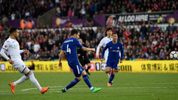 SWANSEA, WALES - APRIL 28: Cesc Fabregas of Chelsea scores his sides first goal during the Premier League match between Swansea City and Chelsea at Liberty Stadium on April 28, 2018 in Swansea, Wales. (Photo by Stu Forster/Getty Images)