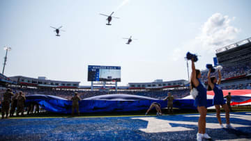 Sep 17, 2022; Lexington, Kentucky, USA; Air Force ROTC members hold a large American Flag across the field before the game between the Kentucky Wildcats and the Youngstown State Penguins at Kroger Field. Mandatory Credit: Jordan Prather-USA TODAY Sports