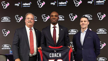 HOUSTON, TEXAS - FEBRUARY 02: DeMeco Ryans (C) is introduced as the Houston Texans head coach by Chairman and CEO Cal McNair (L) and general manager Nick Caserio at NRG Stadium on February 02, 2023 in Houston, Texas. (Photo by Bob Levey/Getty Images)