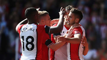 SOUTHAMPTON, ENGLAND - AUGUST 19: Dusan Tadic of Southampton celebrates scoring his sides second goal with his Southampton team mates during the Premier League match between Southampton and West Ham United at St Mary's Stadium on August 19, 2017 in Southampton, England. (Photo by Julian Finney/Getty Images)
