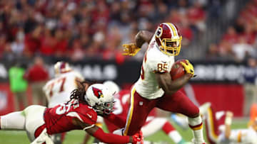 Dec 4, 2016; Glendale, AZ, USA; Washington Redskins tight end Vernon Davis (85) avoids the tackle attempt by Arizona Cardinals safety D.J. Swearinger at University of Phoenix Stadium. The Cardinals defeated the Redskins 31-23. Mandatory Credit: Mark J. Rebilas-USA TODAY Sports