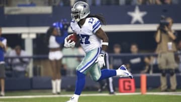Oct 13, 2013; Arlington, TX, USA; Dallas Cowboys wide receiver Dwayne Harris (17) returns a kick during the first quarter of the game Washington Redskins at AT