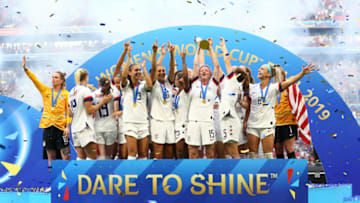 LYON, FRANCE - JULY 07: Megan Rapinoe of the USA lifts the FIFA Women's World Cup Trophy following her team's victory in the 2019 FIFA Women's World Cup France Final match between The United States of America and The Netherlands at Stade de Lyon on July 07, 2019 in Lyon, France. (Photo by Maddie Meyer - FIFA/FIFA via Getty Images)