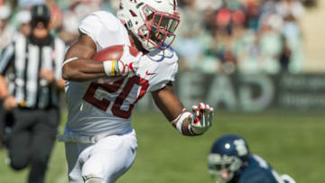 SYDNEY, AUSTRALIA - AUGUST 27: Bryce Love of Stanford makes a break during the College Football Sydney Cup match between Stanford University (Stanford Cardinal) and Rice University (Rice Owls) at Allianz Stadium on August 27, 2017 in Sydney, Australia. (Photo by Steve Christo - Corbis/Corbis via Getty Images)