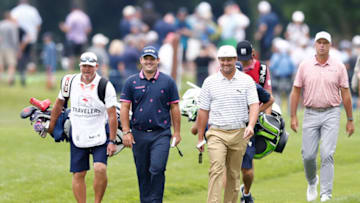Bryson DeChambeau, Patrick Reed, (Photo by Michael Reaves/Getty Images)