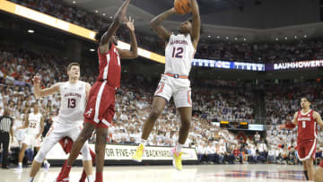 Auburn basketballFeb 1, 2022; Auburn, Alabama, USA; Auburn Tigers guard Zep Jasper (12) goes for a shot against the Alabama Crimson Tide during the second half at Auburn Arena. Mandatory Credit: John Reed-USA TODAY Sports