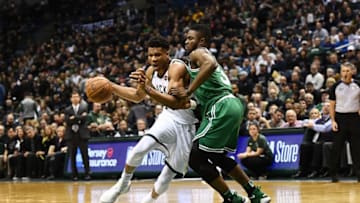 MILWAUKEE, WI - APRIL 20: Giannis Antetokounmpo #34 of the Milwaukee Bucks drives around Semi Ojeleye #37 of the Boston Celtics during the second half of game three of round one of the Eastern Conference playoffs at the Bradley Center on April 20, 2018 in Milwaukee, Wisconsin. NOTE TO USER: User expressly acknowledges and agrees that, by downloading and or using this photograph, User is consenting to the terms and conditions of the Getty Images License Agreement. (Photo by Stacy Revere/Getty Images)