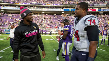 Oct 9, 2016; Minneapolis, MN, USA; Minnesota Vikings running back Adrian Peterson (28) speaks with Houston Texans tackle Chris Clark (74) after the game at U.S. Bank Stadium. The Vikings win 31-13. Mandatory Credit: Bruce Kluckhohn-USA TODAY Sports