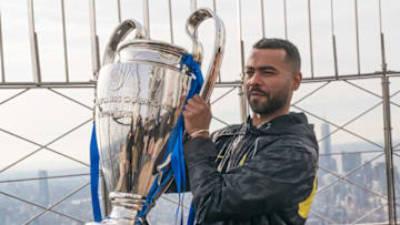 NEW YORK, UNITED STATES - 2021/12/09: Chelsea FC legend Ashley Cole poses with Champions League Trophy at observation deck of the Empire State Building. (Photo by Lev Radin/Pacific Press/LightRocket via Getty Images)