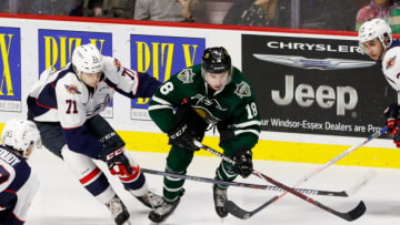 WINDSOR, ON - OCTOBER 04: Forward Liam Foudy #18 of the London Knights moves the puck against defenceman Lev Starikov #71 of the Windsor Spitfires on October 4, 2018 at the WFCU Centre in Windsor, Ontario, Canada. (Photo by Dennis Pajot/Getty Images)