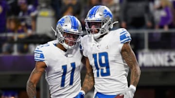 MINNEAPOLIS, MINNESOTA - DECEMBER 08: Marvin Jones #11 of the Detroit Lions congratulates teammate Kenny Golladay #19 on a touchdown against the Minnesota Vikings during the fourth quarter of the game at U.S. Bank Stadium on December 8, 2019 in Minneapolis, Minnesota. The Vikings defeated the Lions 20-7. (Photo by Hannah Foslien/Getty Images)