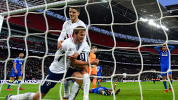LONDON, ENGLAND - JANUARY 07: Harry Kane of Tottenham Hotspur celebrates scoring his side's first goal with Erik Lamela during The Emirates FA Cup Third Round match between Tottenham Hotspur and AFC Wimbledon at Wembley Stadium on January 7, 2018 in London, England. (Photo by Mike Hewitt/Getty Images)