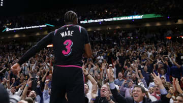 MIAMI, FLORIDA - FEBRUARY 27: Dwyane Wade #3 of the Miami Heat celebrates after hitting a game-winning three pointer against the Golden State Warriors at American Airlines Arena on February 27, 2019 in Miami, Florida. NOTE TO USER: User expressly acknowledges and agrees that, by downloading and or using this photograph, User is consenting to the terms and conditions of the Getty Images License Agreement. (Photo by Michael Reaves/Getty Images)