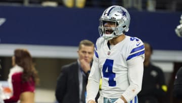 ARLINGTON, TX - DECEMBER 24: Quarterback Dak Prescott #4 of the Dallas Cowboys celebrates after scoring a touchdown against the Philadelphia Eagles during the second half at AT&T Stadium on December 24, 2022 in Arlington, Texas. (Photo by Cooper Neill/Getty Images)