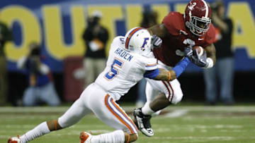Trent Richardson of Alabama football vs. Florida football's Joe Haden (Photo by Chris Graythen/Getty Images)
