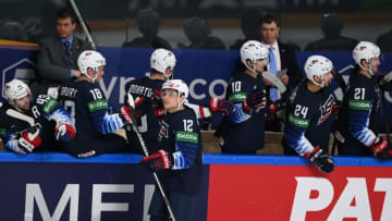 US' forward Trevor Moore celebrates with teammates scoring during the IIHF Men's Ice Hockey World Championships preliminary round group B game between USA and Kazakhstan at the Arena Riga in Riga, Latvia, on May 25, 2021. (Photo by Gints IVUSKANS / AFP) (Photo by GINTS IVUSKANS/AFP via Getty Images)