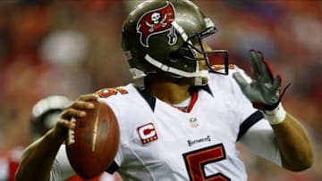 Dec 30, 2012; Atlanta, GA, USA; Tampa Bay Buccaneers quarterback Josh Freeman (5) drops back to pass during second half of the game at the Georgia Dome. The Buccaneers defeated the Falcons 22-17. Mandatory Credit: Josh D. Weiss-USA TODAY Sports