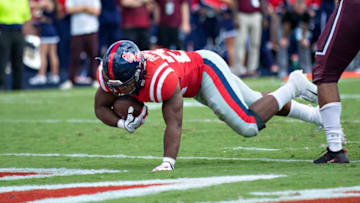 OXFORD, MS - SEPTEMBER 8: Scottie Phillips #22 of the Mississippi Rebels dives into the end zone for a touchdown against the Southern Illinois Salukis during the first half at Vaught-Hemingway Stadium on September 8, 2018 in Oxford, Mississippi. (Photo by Wesley Hitt/Getty Images)