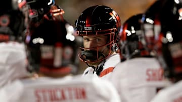 AUSTIN, TX - NOVEMBER 24: Nic Shimonek #16 of the Texas Tech Red Raiders huddles with teammates before the game against the Texas Longhorns at Darrell K Royal-Texas Memorial Stadium on November 24, 2017 in Austin, Texas. (Photo by Tim Warner/Getty Images)