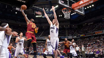 SACRAMENTO, CA - MARCH 9: LeBron James #23 of the Cleveland Cavaliers shoots against Kosta Koufos #41 of the Sacramento Kings on March 9, 2016 at Sleep Train Arena in Sacramento, California. NOTE TO USER: User expressly acknowledges and agrees that, by downloading and or using this photograph, User is consenting to the terms and conditions of the Getty Images Agreement. Mandatory Copyright Notice: Copyright 2016 NBAE (Photo by Rocky Widner/NBAE via Getty Images)