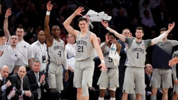 NEW YORK, NY - MARCH 27: The Penn State Nittany Lions bench celebrates in the second quarter against the Mississippi State Bulldogs during their 2018 National Invitation Tournament Championship semifinals game at Madison Square Garden on March 27, 2018 in New York City. (Photo by Abbie Parr/Getty Images)