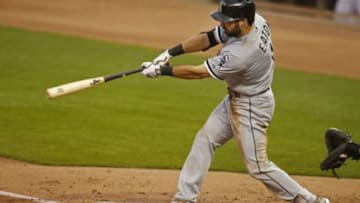 Jul 24, 2014; Minneapolis, MN, USA; Chicago White Sox center fielder Adam Eaton (1) hits a two run single against the Minnesota Twins at Target Field. The White Sox win 5-2. Mandatory Credit: Bruce Kluckhohn-USA TODAY Sports