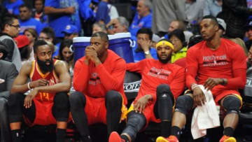 May 8, 2015; Los Angeles, CA, USA; Houston Rockets guard James Harden (13), forward Josh Smith (5) and center Dwight Howard (12) watch game action against the Los Angeles Clippers during the second half in game three of the second round of the NBA Playoffs. at Staples Center. Mandatory Credit: Gary A. Vasquez-USA TODAY Sports