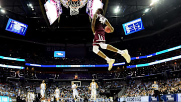 CHARLOTTE, NC - MARCH 18: Robert Williams #44 of the Texas A&M Aggies dunks on the North Carolina Tar Heels during the second round of the 2018 NCAA Men's Basketball Tournament at Spectrum Center on March 18, 2018 in Charlotte, North Carolina. (Photo by Jared C. Tilton/Getty Images)