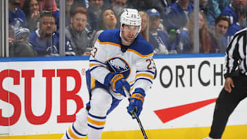 TORONTO, ON - APRIL 12: Mattias Samuelsson #23 of the Buffalo Sabres skates with the puck against the Toronto Maple Leafs during an NHL game at Scotiabank Arena on April 12, 2022 in Toronto, Ontario, Canada. The Sabres defeated the Maple Leafs 5-2. (Photo by Claus Andersen/Getty Images)