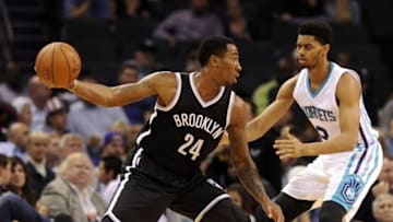 Nov 18, 2015; Charlotte, NC, USA; Brooklyn Nets guard forward Rondae Hollis-Jefferson (24) prepares to pass the ball as he is guarded by Charlotte Hornets guard Jeremy Lamb (3) during the first half of the game at Time Warner Cable Arena. Mandatory Credit: Sam Sharpe-USA TODAY Sports