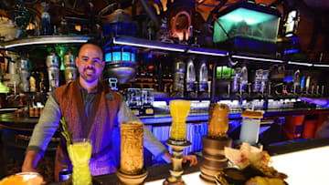 ORLANDO, FLORIDA - AUGUST 27: A cast member poses at the Oga's Cantina at the Black Spire Outpost at the Star Wars: Galaxy's Edge Walt Disney World Resort Opening at Disney’s Hollywood Studios on August 27, 2019 in Orlando, Florida. (Photo by Gerardo Mora/Getty Images)