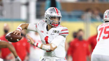 Jan 11, 2021; Miami Gardens, Florida, USA; Ohio State Buckeyes quarterback Justin Fields (1) against the Alabama Crimson Tide in the 2021 CFP National Championship Game. Mandatory Credit: Mark J. Rebilas-USA TODAY Sports