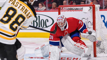 MONTREAL, QC - DECEMBER 17: Boston Bruins right wing David Pastrnak (88) shoots on Montreal Canadiens goaltender Carey Price (31) during the third period of the NHL game between the Boston Bruins and the Montreal Canadiens on December 17, 2018, at the Bell Centre in Montreal, QC (Photo by Vincent Ethier/Icon Sportswire via Getty Images)