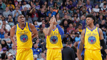 SACRAMENTO, CA - MARCH 31: Kevon Looney #5, Patrick McCaw #0 and Nick Young #6 of the Golden State Warriors face the Sacramento Kings on March 31, 2018 at Golden 1 Center in Sacramento, California. NOTE TO USER: User expressly acknowledges and agrees that, by downloading and or using this photograph, User is consenting to the terms and conditions of the Getty Images Agreement. Mandatory Copyright Notice: Copyright 2018 NBAE (Photo by Rocky Widner/NBAE via Getty Images)