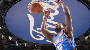OKC Thunder: Deonte Burton #30 dunks the ball during a pre-season game against the Dallas Mavericks (Photo by Glenn James/NBAE via Getty Images)