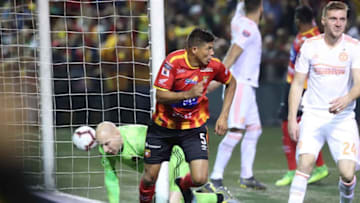 HEREDIA, COSTA RICA- FEBRUARY 21: Oscar Esteban Granados celebrates after scoring his team's third goal, of CS Herediana, during the first leg of the 2019 CONCACAF Champions League at the Eladio Rosabal Cordero stadium on February 21, 2019 in Heredia Costa Rica. (Photo by John Durán/Getty Images)