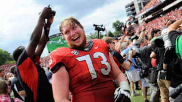 Sep 27, 2014; Athens, GA, USA; Georgia Bulldogs guard Greg Pyke (73) reacts on the field after defeating the Tennessee Volunteers at Sanford Stadium. Georgia defeated Tennessee 35-32. Mandatory Credit: Dale Zanine-USA TODAY Sports