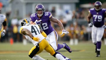 CANTON, OH - AUGUST 9: Kyle Rudolph #82 of the Minnesota Vikings runs upfield after a reception in the first quarter of the NFL Hall of Fame Game against the Pittsburgh Steelers at Tom Benson Hall of Fame Stadium on August 9, 2015 in Canton, Ohio. (Photo by Joe Robbins/Getty Images)