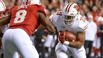 LINCOLN, NE - OCTOBER 07: Running back Jonathan Taylor #23 of the Wisconsin Badgers takes on cornerback Chris Jones #8 of the Nebraska Cornhuskers at Memorial Stadium on October 7, 2017 in Lincoln, Nebraska. (Photo by Steven Branscombe/Getty Images)