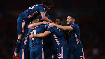 LONDON, ENGLAND - DECEMBER 03: Pablo Mari of Arsenal celebrates scoring his sides second goal with team mates during the UEFA Europa League Group B stage match between Arsenal FC and Rapid Wien at Emirates Stadium on December 03, 2020 in London, England. A limited number of fans are welcomed back to stadiums to watch elite football across England. This was following easing of restrictions on spectators in tiers one and two areas only (Photo by Marc Atkins/Getty Images)
