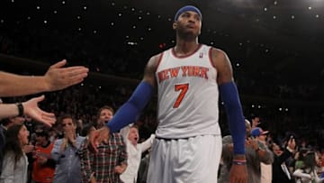 Nov 14, 2013; New York, NY, USA; New York Knicks small forward Carmelo Anthony (7) and fans react after he was fouled late during the fourth quarter of a game against the Houston Rockets at Madison Square Garden. Mandatory Credit: Brad Penner-USA TODAY Sports