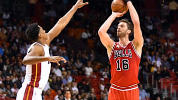 Mar 1, 2016; Miami, FL, USA; Chicago Bulls center Pau Gasol (16) shoots over Miami Heat center Hassan Whiteside (21) during the first half at American Airlines Arena. Mandatory Credit: Steve Mitchell-USA TODAY Sports